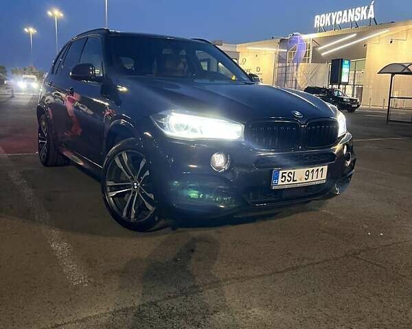 Черный БМВ Х5, объемом двигателя 3 л и пробегом 248 тыс. км за 23600 $, фото 1 на Automoto.ua