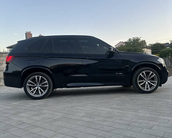 Чорний БМВ Х5, об'ємом двигуна 3 л та пробігом 320 тис. км за 25950 $, фото 1 на Automoto.ua