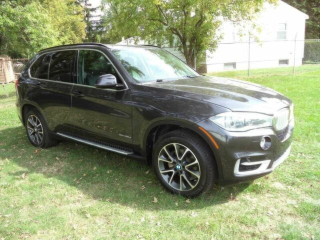 Черный БМВ Х5, объемом двигателя 3 л и пробегом 73 тыс. км за 12000 $, фото 1 на Automoto.ua