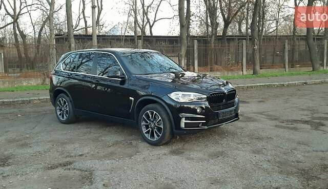 Черный БМВ Х5, объемом двигателя 2 л и пробегом 154 тыс. км за 25500 $, фото 1 на Automoto.ua