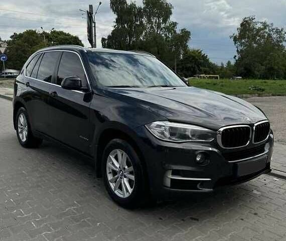 Черный БМВ Х5, объемом двигателя 2 л и пробегом 150 тыс. км за 21700 $, фото 1 на Automoto.ua