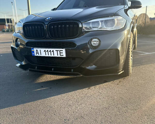 Черный БМВ Х5, объемом двигателя 3 л и пробегом 178 тыс. км за 34500 $, фото 1 на Automoto.ua