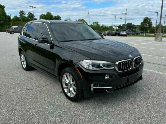 Черный БМВ Х5, объемом двигателя 3 л и пробегом 76 тыс. км за 11900 $, фото 1 на Automoto.ua