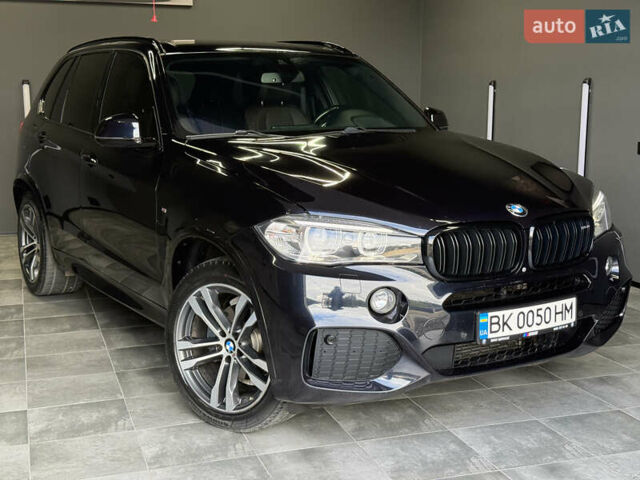 Чорний БМВ Х5, об'ємом двигуна 3 л та пробігом 218 тис. км за 33999 $, фото 1 на Automoto.ua