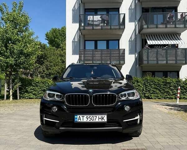 Черный БМВ Х5, объемом двигателя 2 л и пробегом 150 тыс. км за 28059 $, фото 1 на Automoto.ua