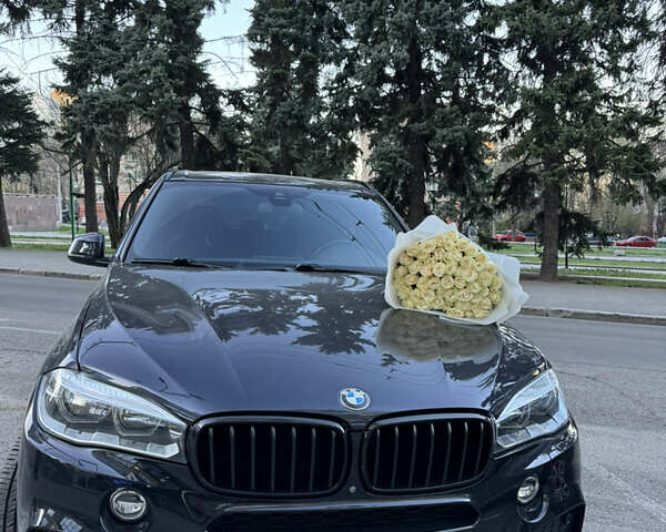 Черный БМВ Х5, объемом двигателя 3 л и пробегом 128 тыс. км за 29500 $, фото 1 на Automoto.ua