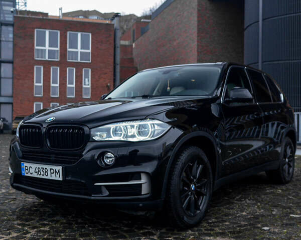 Черный БМВ Х5, объемом двигателя 2 л и пробегом 167 тыс. км за 23000 $, фото 1 на Automoto.ua