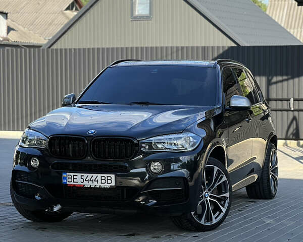 Черный БМВ Х5, объемом двигателя 3 л и пробегом 225 тыс. км за 38888 $, фото 1 на Automoto.ua