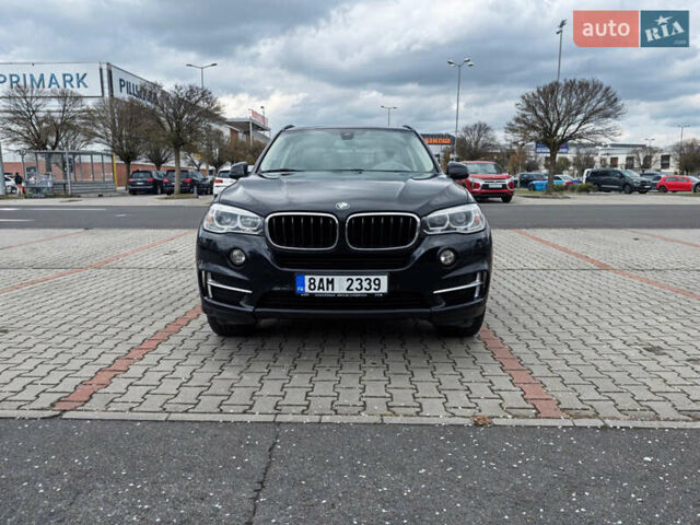 Чорний БМВ Х5, об'ємом двигуна 2 л та пробігом 205 тис. км за 22746 $, фото 1 на Automoto.ua