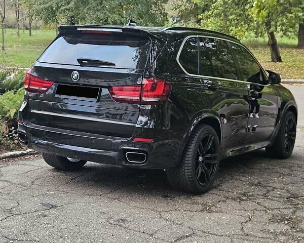 Черный БМВ Х5, объемом двигателя 2 л и пробегом 203 тыс. км за 26000 $, фото 1 на Automoto.ua