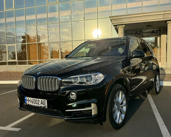 Черный БМВ Х5, объемом двигателя 2 л и пробегом 120 тыс. км за 27900 $, фото 1 на Automoto.ua