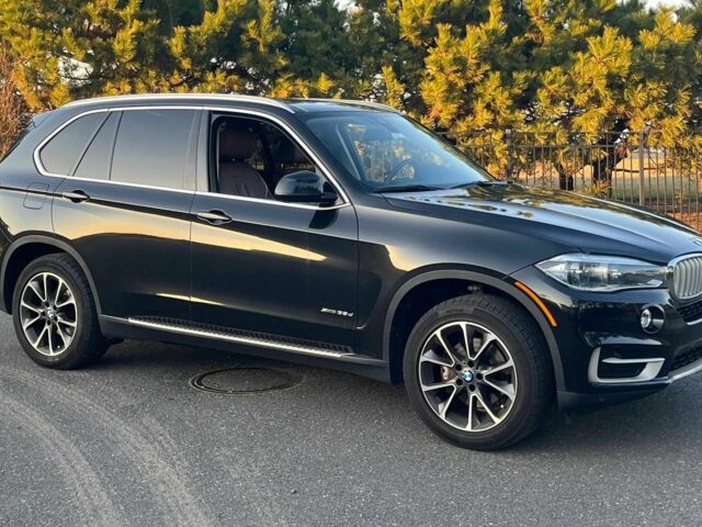 Черный БМВ Х5, объемом двигателя 3 л и пробегом 147 тыс. км за 17500 $, фото 1 на Automoto.ua