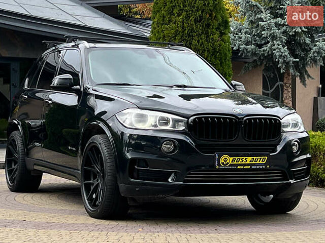 Черный БМВ Х5, объемом двигателя 2 л и пробегом 180 тыс. км за 26800 $, фото 1 на Automoto.ua