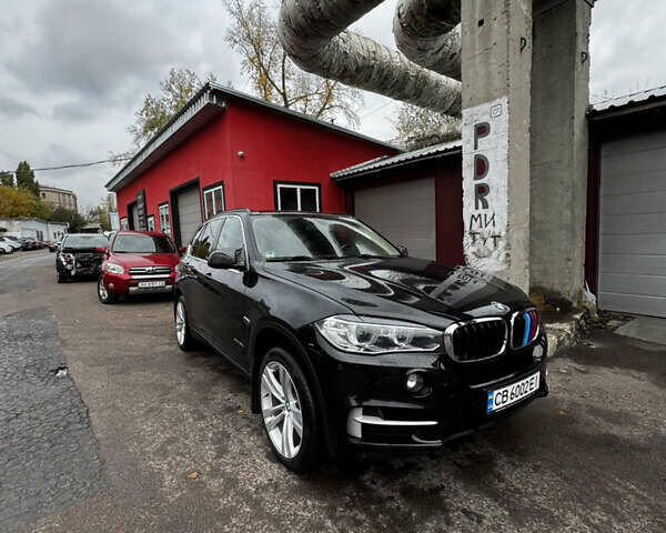 Черный БМВ Х5, объемом двигателя 2 л и пробегом 147 тыс. км за 29500 $, фото 1 на Automoto.ua