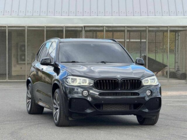 Чорний БМВ Х5, об'ємом двигуна 3 л та пробігом 71 тис. км за 15000 $, фото 1 на Automoto.ua