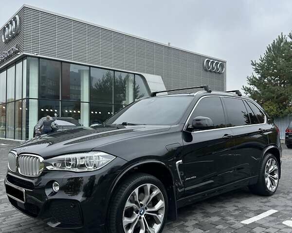 Черный БМВ Х5, объемом двигателя 2 л и пробегом 107 тыс. км за 33000 $, фото 1 на Automoto.ua