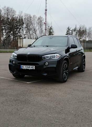 Чорний БМВ Х5, об'ємом двигуна 2 л та пробігом 200 тис. км за 26500 $, фото 1 на Automoto.ua