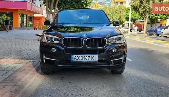 Черный БМВ Х5, объемом двигателя 2 л и пробегом 107 тыс. км за 32000 $, фото 1 на Automoto.ua