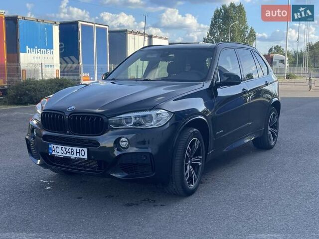 Чорний БМВ Х5, об'ємом двигуна 2 л та пробігом 195 тис. км за 33200 $, фото 1 на Automoto.ua