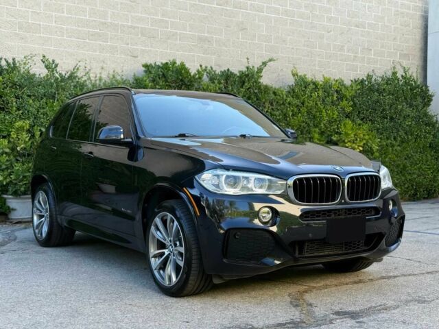 Чорний БМВ Х5, об'ємом двигуна 3 л та пробігом 62 тис. км за 24900 $, фото 1 на Automoto.ua