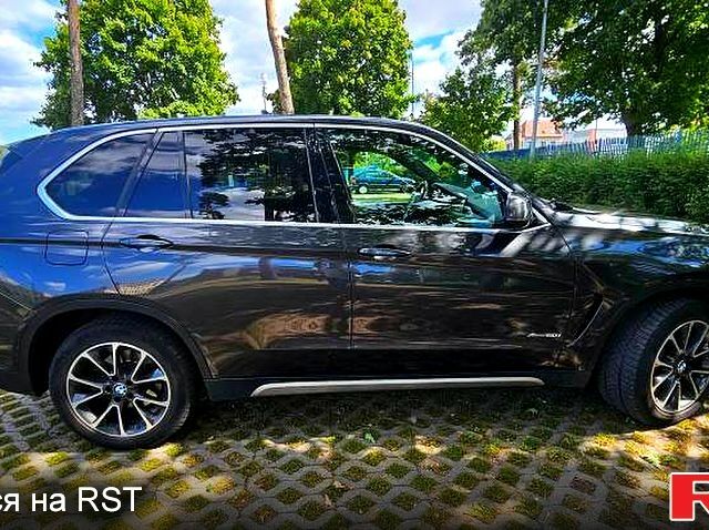 Черный БМВ Х5, объемом двигателя 4.4 л и пробегом 120 тыс. км за 13500 $, фото 1 на Automoto.ua