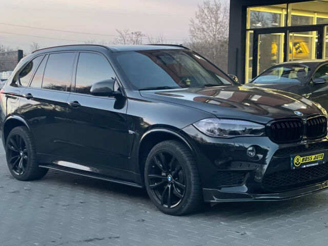 Чорний БМВ Х5, об'ємом двигуна 3 л та пробігом 73 тис. км за 45500 $, фото 1 на Automoto.ua