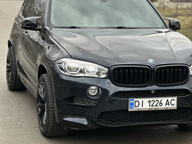 Черный БМВ Х5, объемом двигателя 3 л и пробегом 219 тыс. км за 38500 $, фото 1 на Automoto.ua