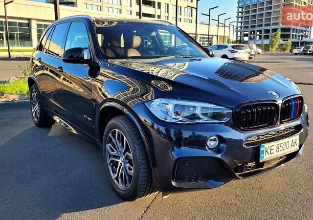 Черный БМВ Х5, объемом двигателя 2 л и пробегом 99 тыс. км за 29500 $, фото 1 на Automoto.ua