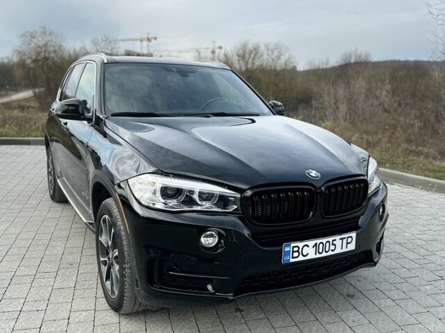 Черный БМВ Х5, объемом двигателя 2 л и пробегом 100 тыс. км за 28700 $, фото 1 на Automoto.ua