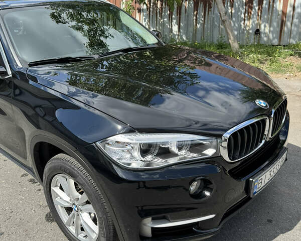 Черный БМВ Х5, объемом двигателя 2 л и пробегом 54 тыс. км за 39300 $, фото 1 на Automoto.ua