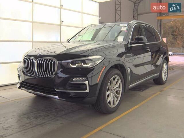 Черный БМВ Х5, объемом двигателя 3 л и пробегом 143 тыс. км за 29400 $, фото 1 на Automoto.ua