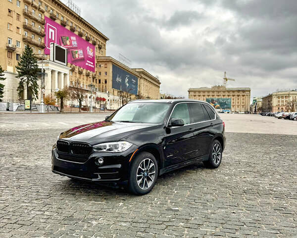 Чорний БМВ Х5, об'ємом двигуна 2 л та пробігом 143 тис. км за 30500 $, фото 1 на Automoto.ua