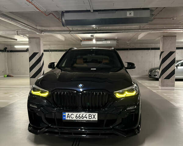Чорний БМВ Х5, об'ємом двигуна 3 л та пробігом 107 тис. км за 63999 $, фото 1 на Automoto.ua