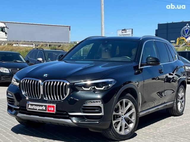 Черный БМВ Х5, объемом двигателя 3 л и пробегом 83 тыс. км за 48490 $, фото 1 на Automoto.ua