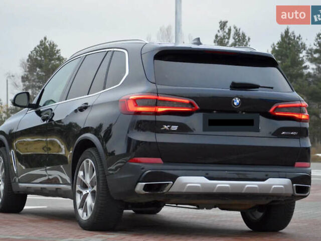 Чорний БМВ Х5, об'ємом двигуна 3 л та пробігом 63 тис. км за 18400 $, фото 1 на Automoto.ua