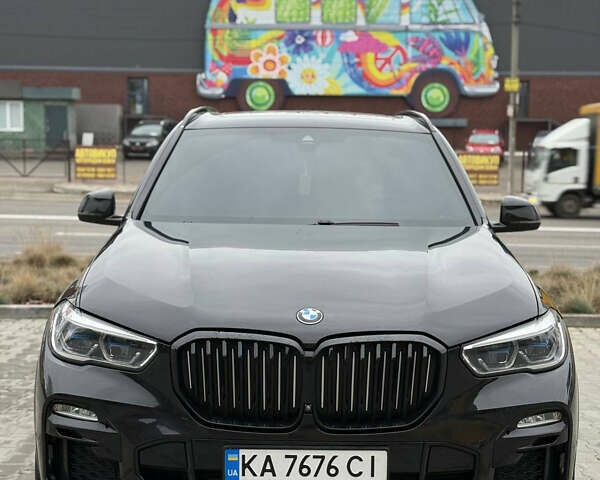 Черный БМВ Х5, объемом двигателя 3 л и пробегом 85 тыс. км за 58000 $, фото 1 на Automoto.ua