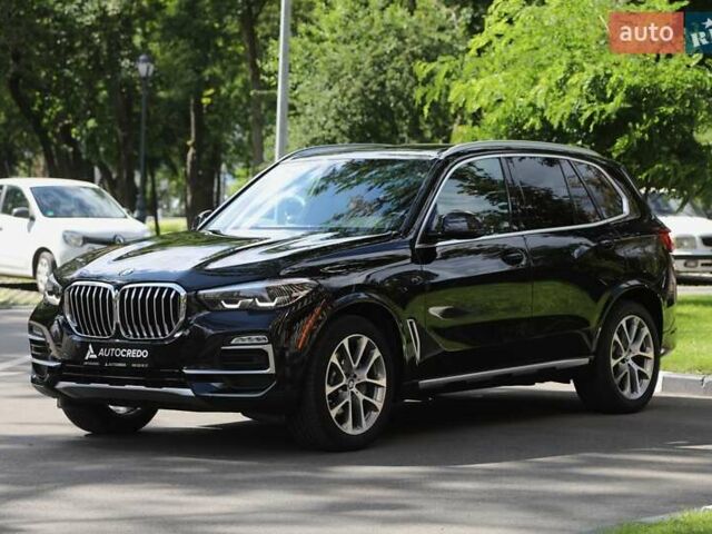 Чорний БМВ Х5, об'ємом двигуна 3 л та пробігом 100 тис. км за 52000 $, фото 1 на Automoto.ua