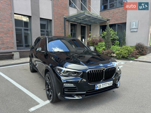 Черный БМВ Х5, объемом двигателя 3 л и пробегом 142 тыс. км за 57500 $, фото 1 на Automoto.ua