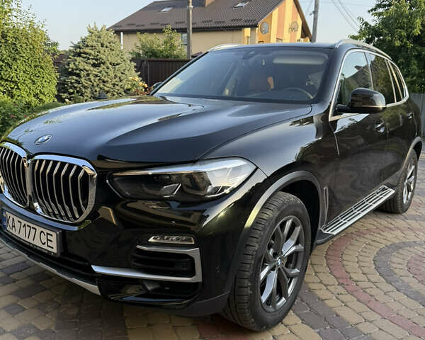 Черный БМВ Х5, объемом двигателя 2.99 л и пробегом 74 тыс. км за 63000 $, фото 1 на Automoto.ua