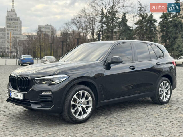 Черный БМВ Х5, объемом двигателя 3 л и пробегом 150 тыс. км за 48000 $, фото 1 на Automoto.ua