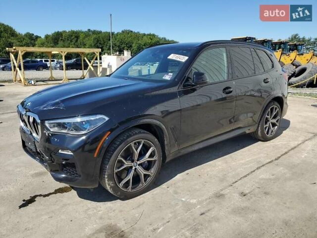 Черный БМВ Х5, объемом двигателя 3 л и пробегом 65 тыс. км за 21500 $, фото 1 на Automoto.ua