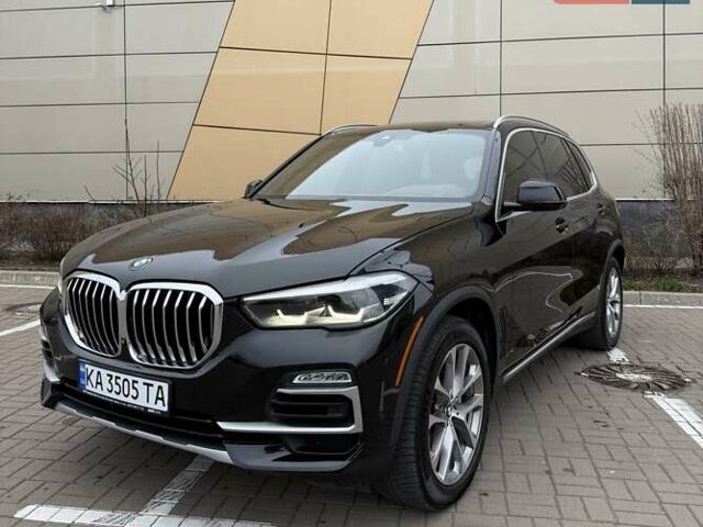 Чорний БМВ Х5, об'ємом двигуна 3 л та пробігом 83 тис. км за 49500 $, фото 1 на Automoto.ua
