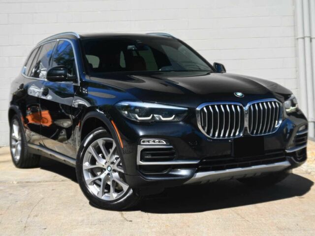 Черный БМВ Х5, объемом двигателя 3 л и пробегом 37 тыс. км за 25000 $, фото 1 на Automoto.ua