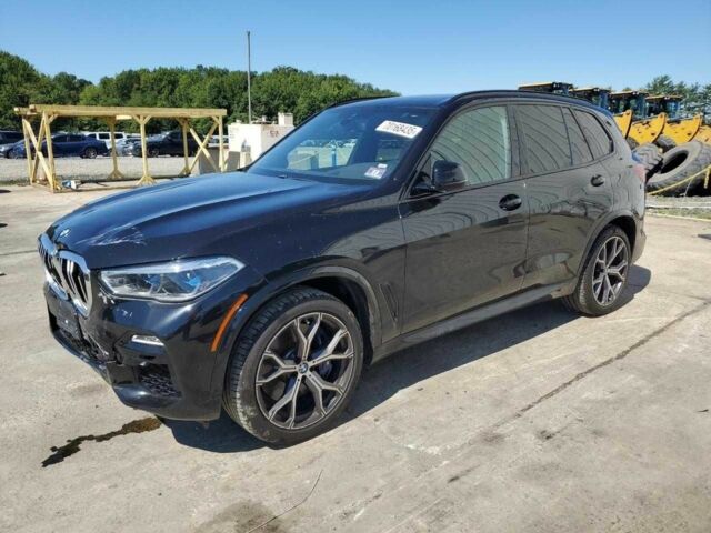 Черный БМВ Х5, объемом двигателя 3 л и пробегом 65 тыс. км за 21500 $, фото 1 на Automoto.ua