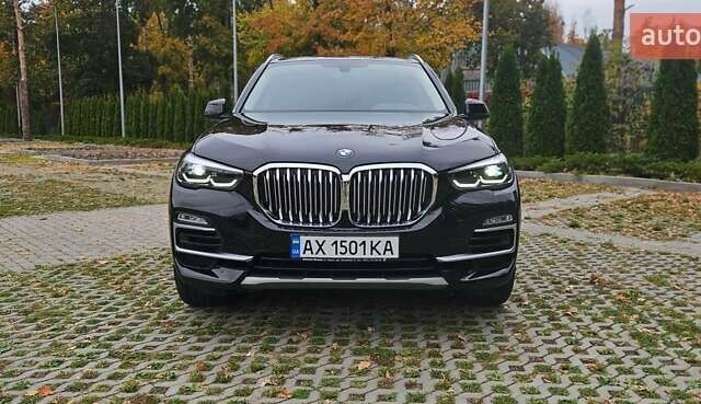 Черный БМВ Х5, объемом двигателя 2 л и пробегом 74 тыс. км за 53000 $, фото 1 на Automoto.ua