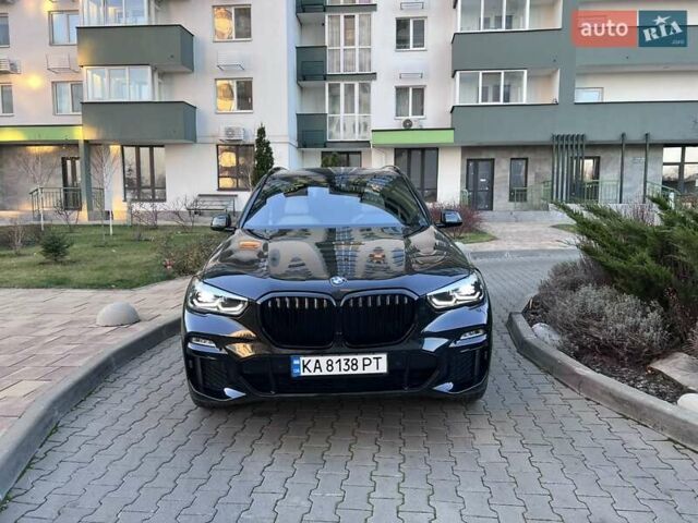 Черный БМВ Х5, объемом двигателя 3 л и пробегом 58 тыс. км за 64500 $, фото 1 на Automoto.ua