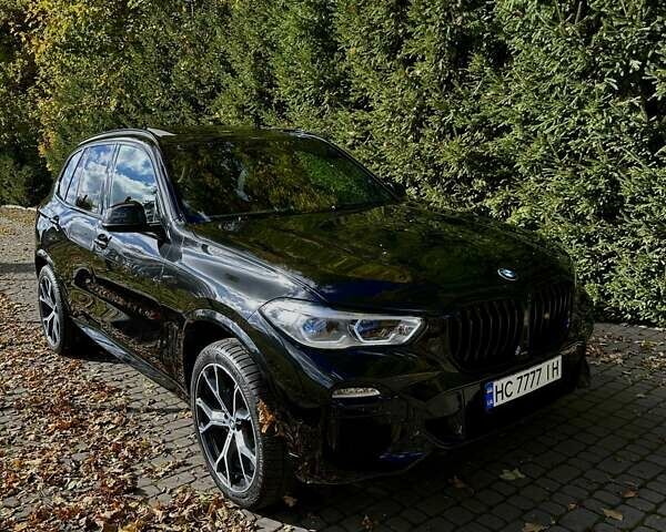 Черный БМВ Х5, объемом двигателя 3 л и пробегом 43 тыс. км за 74000 $, фото 1 на Automoto.ua