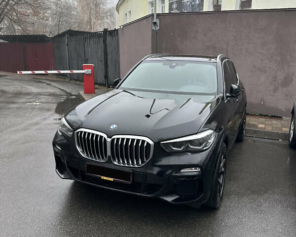 Черный БМВ Х5, объемом двигателя 3 л и пробегом 34 тыс. км за 53900 $, фото 1 на Automoto.ua