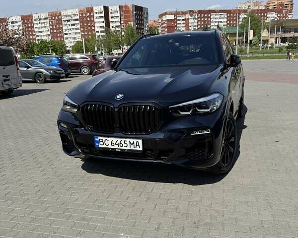 Черный БМВ Х5, объемом двигателя 3 л и пробегом 48 тыс. км за 58900 $, фото 1 на Automoto.ua