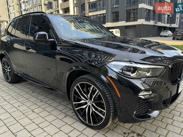 Черный БМВ Х5, объемом двигателя 3 л и пробегом 60 тыс. км за 61900 $, фото 1 на Automoto.ua